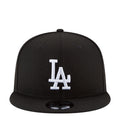 Black baseball cap with white LA logo on front and curved brim