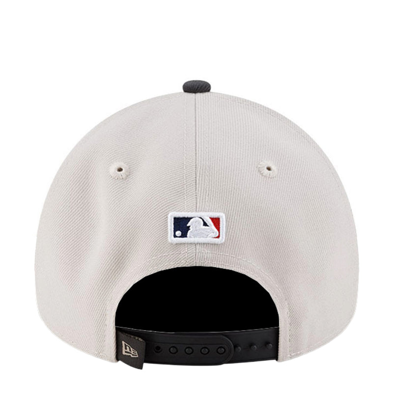 Light beige baseball cap back with MLB logo patch and snapback adjustable band