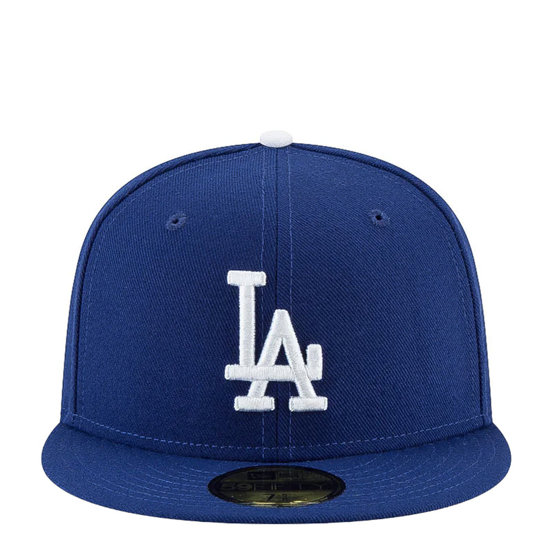 Royal blue baseball cap with white LA logo on front panel