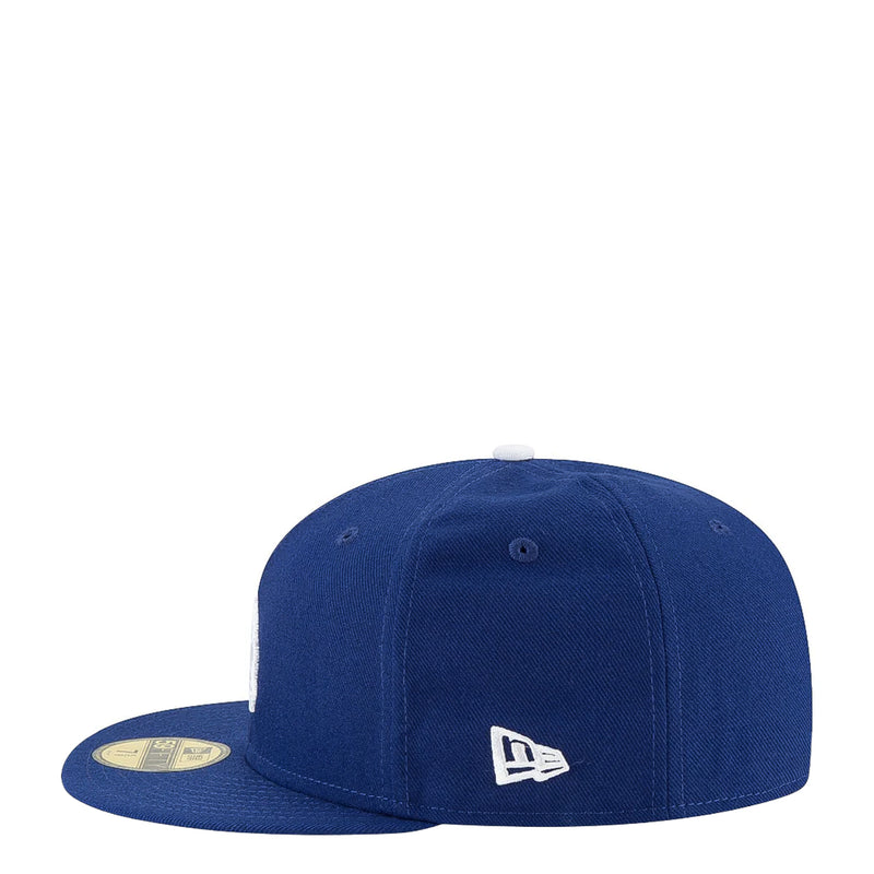 Royal blue baseball cap with New Era logo on front panel