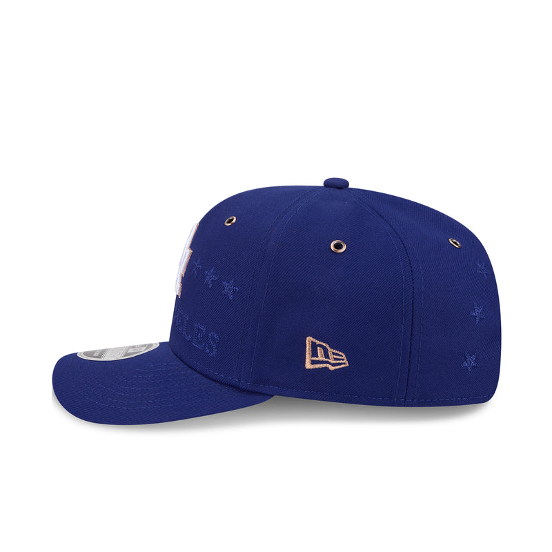 Blue baseball cap with small New Era style logo patch on the side