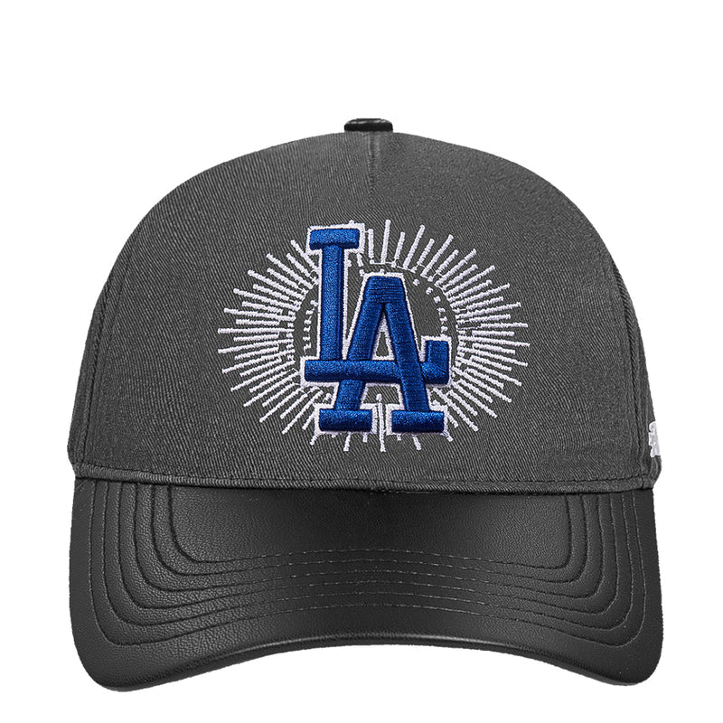 Black washed strapback baseball cap with blue LA logo and wavy lower brim stitching