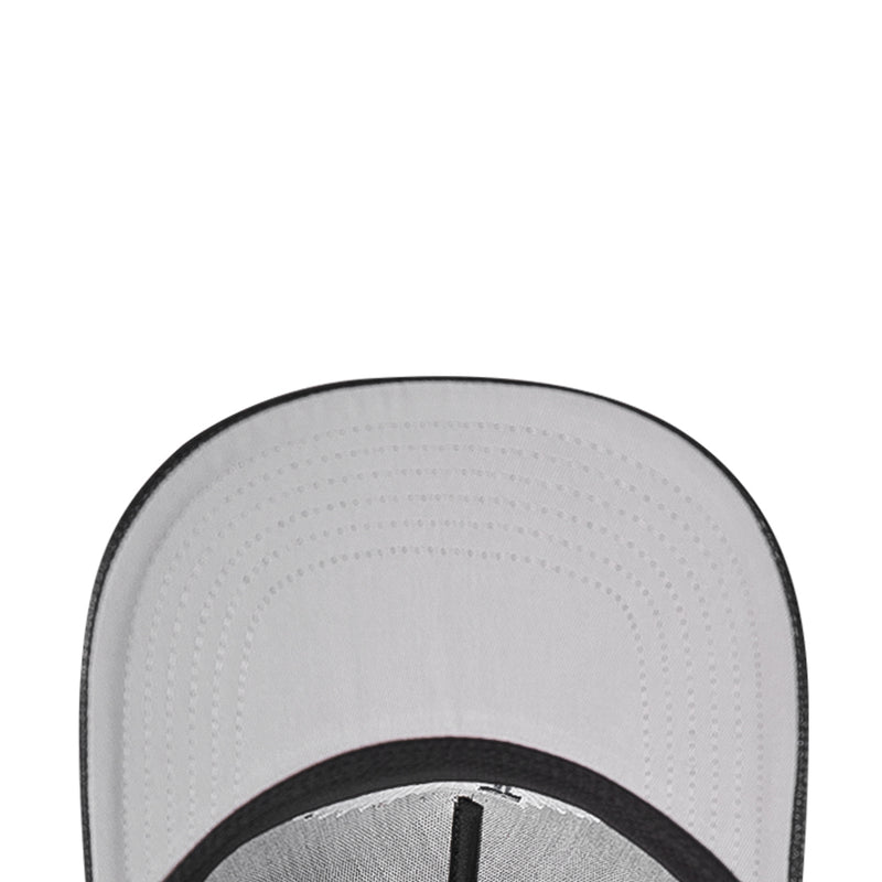 Gray inner panel of a strapback baseball cap with perforated ventilation