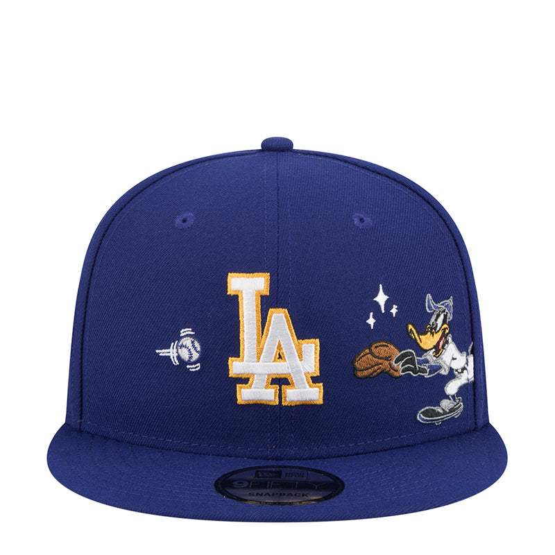 Navy baseball cap with LA logo and Daffy Duck patch, adjustable snapback
