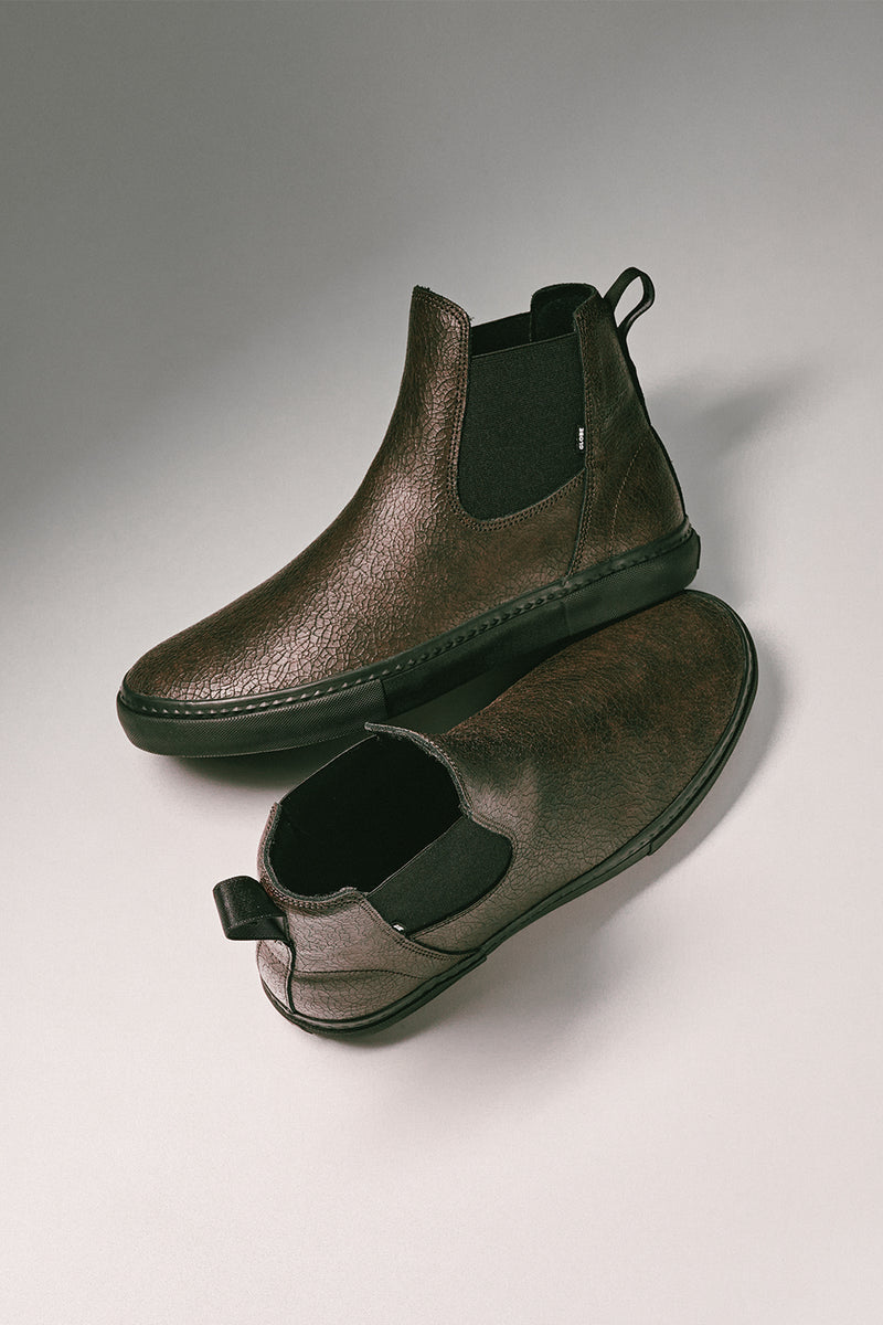Close-up of a pair of Dover II distressed leather Chelsea boots with elastic side panels
