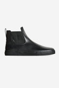 Dover II skate boot in Wasted Talent Black Snake side profile with black leather upper and elastic gusset
