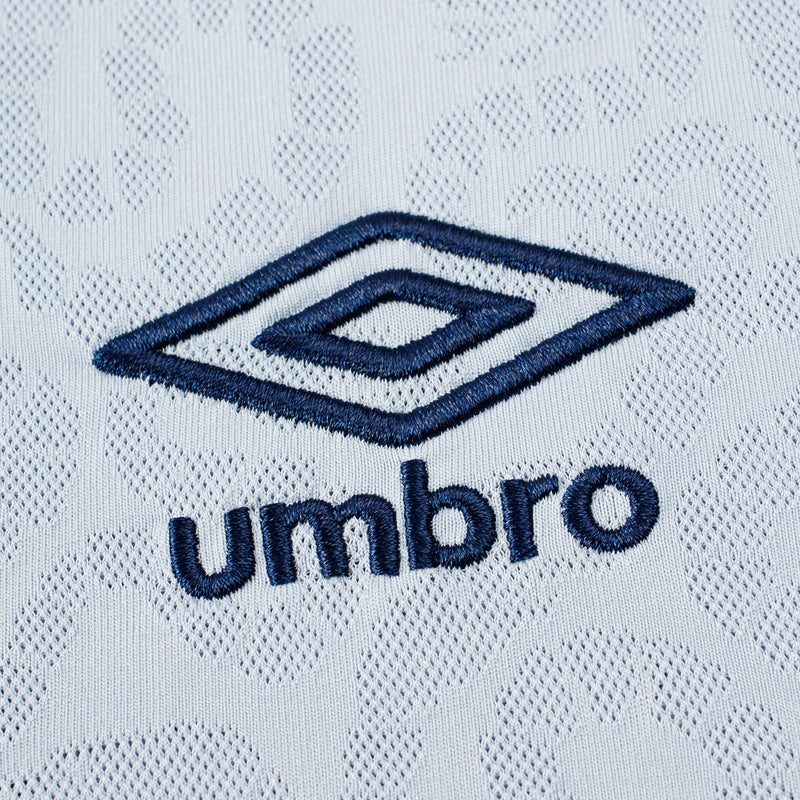 Umbro diamond logo on light grey patterned football jersey