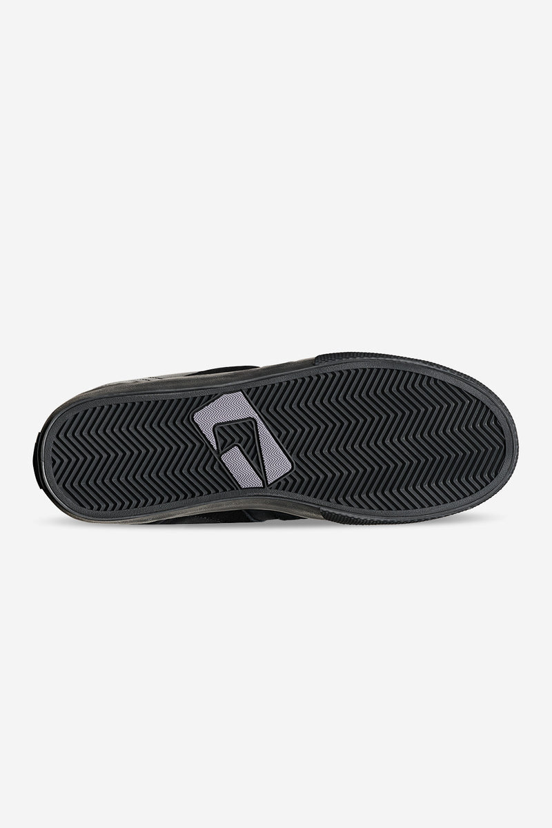 Bottom view of Encore-2 Black Cushion outsole with zigzag tread and a purple emblem insert.