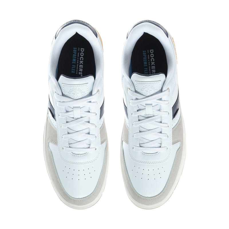 White low-top sneakers with laced uppers; navy heel lining; Dockers logo on tongue.