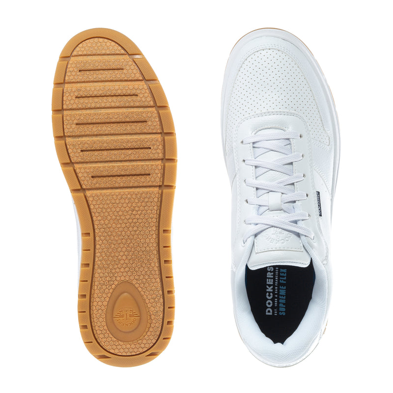 Pair of white sneakers showing brown traction outsole and lace-up upper