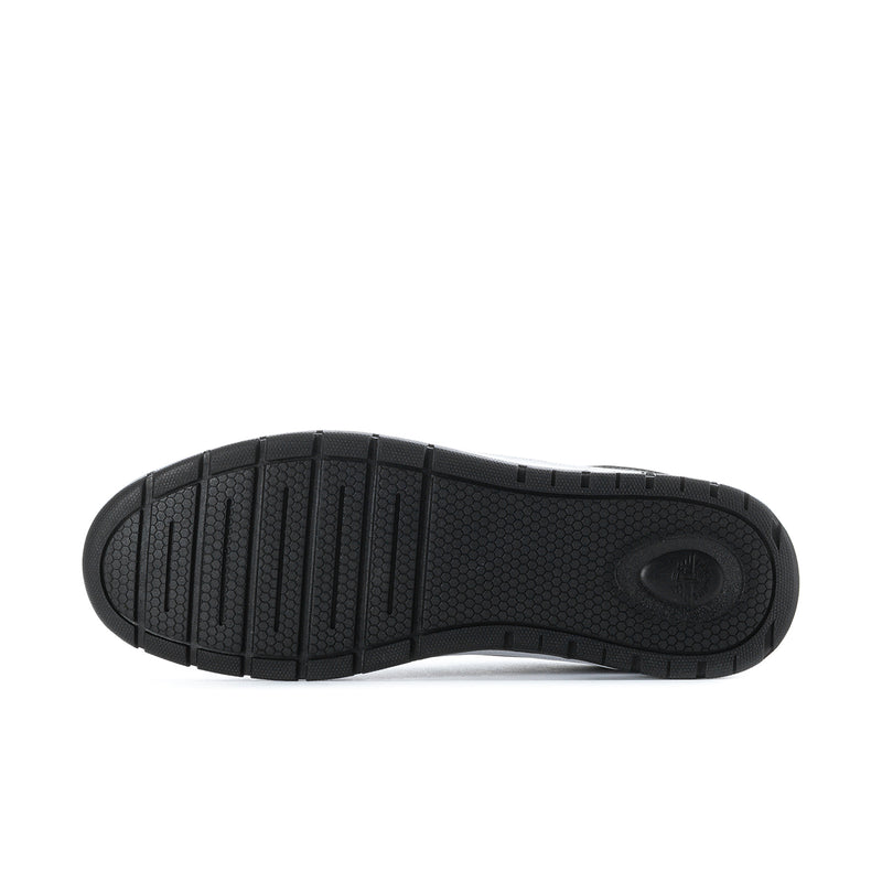 Black outsole for low-top sneaker with patterned traction tread