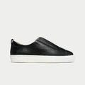 Black leather slip-on sneaker on a light gray background