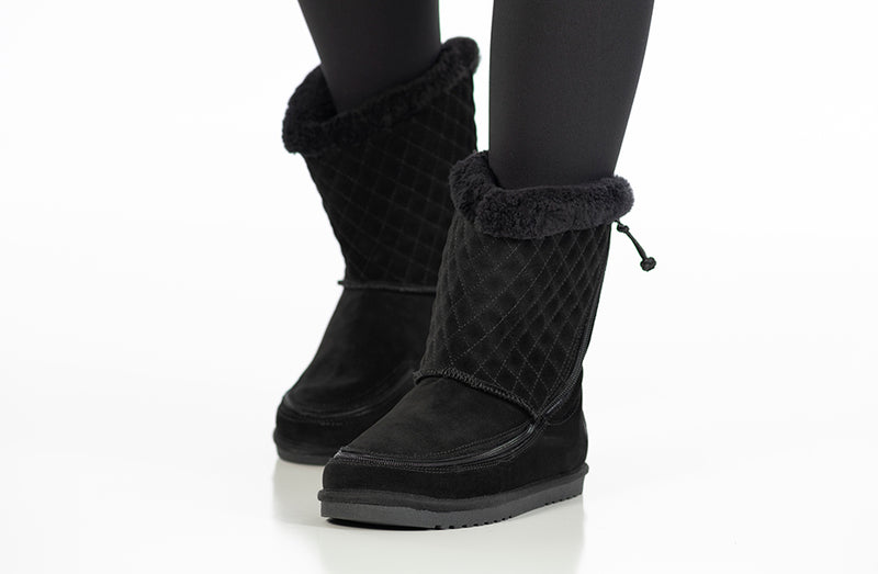 on-foot, toes toward camera, of cozy boot