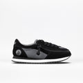 The BILLY Footwear black Kids'/Toddler Joggers are shown on a white background, paired with black and gray sneakers featuring a white sole, black laces, and a side zipper for easy access.