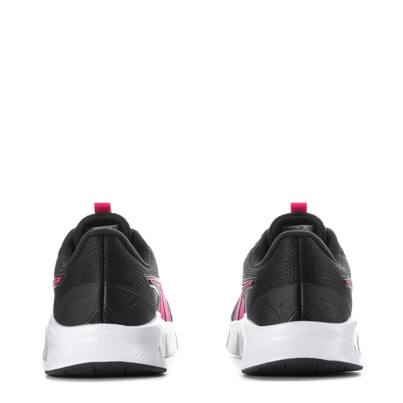Youth black sneakers with pink heel pull tab and white rear cushioning