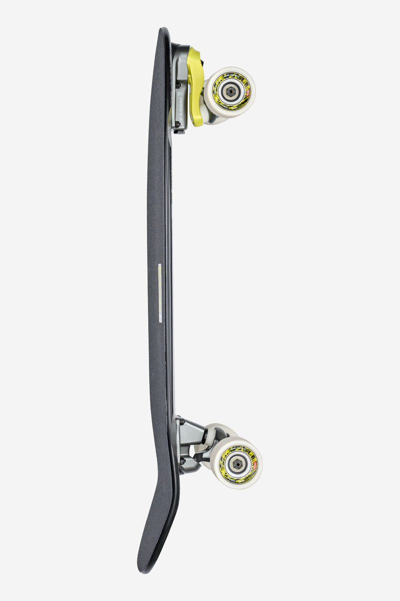 Side profile of Frothy 30 Mission surf skate with trucks mounted and white wheels along the deck edge