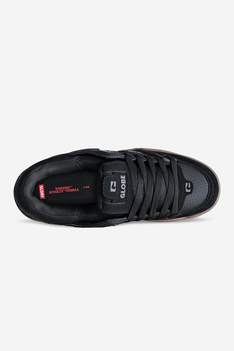 Top view of black Fusion sneaker with laces and Globe branding on the tongue