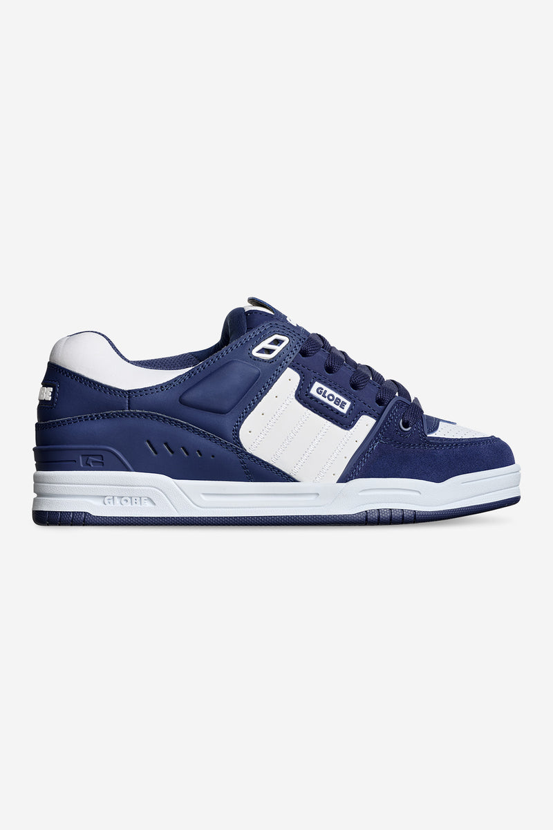 Fusion Midnight White skate shoe side view with navy upper white midsole and blue outsole
