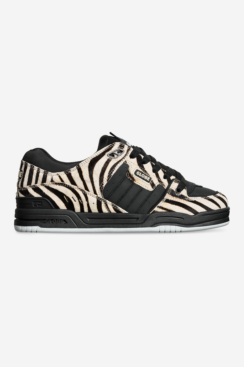 Zebra print Fusion skate shoe with black accents and cushioned sole shown in side profile