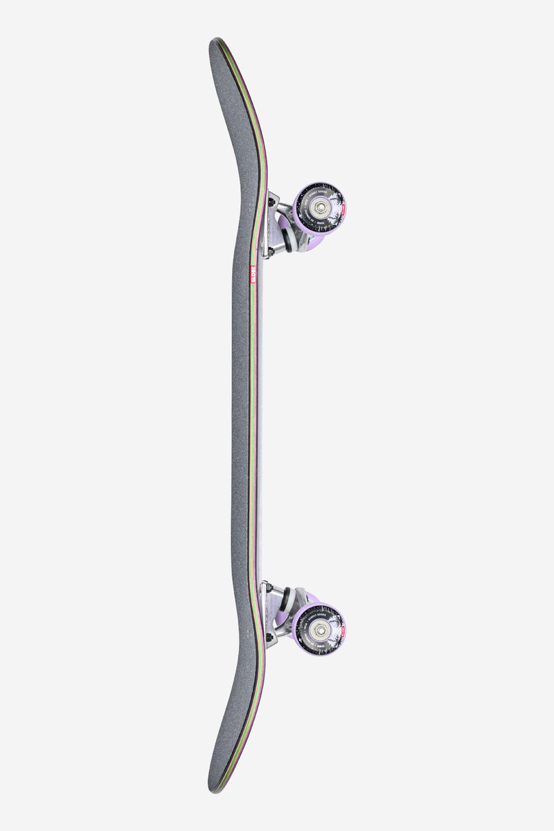 Side view of G2 Reflection 8.5 complete skateboard with purple wheels and silver Tensor trucks.