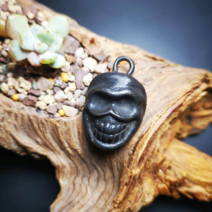 Gandhanra Handmade Skull S¨©tavana Amulet,Smasana Adhipati Pendant,Made of Thokc - Tibetan Buddhist amulet, front view