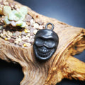 Gandhanra Handmade Skull S¨©tavana Amulet,Smasana Adhipati Pendant,Made of Thokc - Tibetan Buddhist amulet, front view