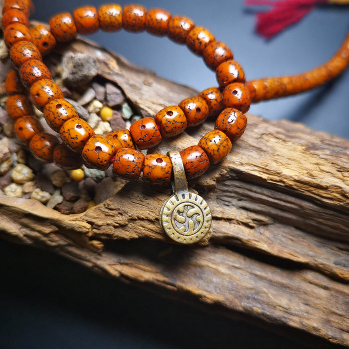 Gandhanra Old Tibetan Buddhist Mala Counter Clip for Prayer Beads,Dharmachakra / - Tibetan Buddhist mala beads, front view