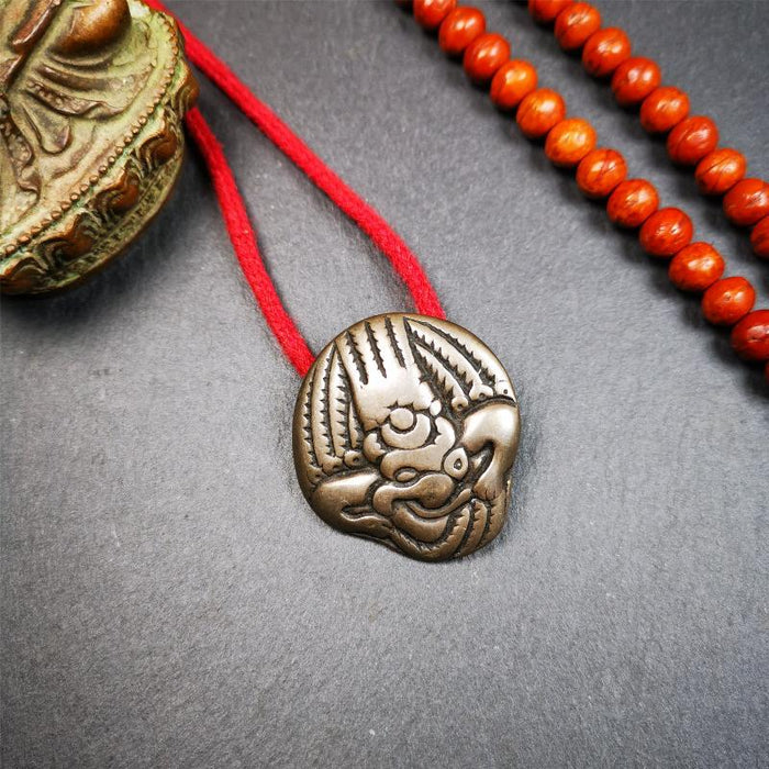 Garuda Amulet - 1.54" - Tibetan Buddhist amulet, close-up detail