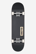 Top view of black Goodstock skateboard with white wheels and silver trucks; Globe label on the deck.