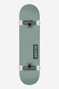 Top view of a Goodstock Fog complete skateboard with an 8.5 inch green deck, white wheels, and silver trucks.