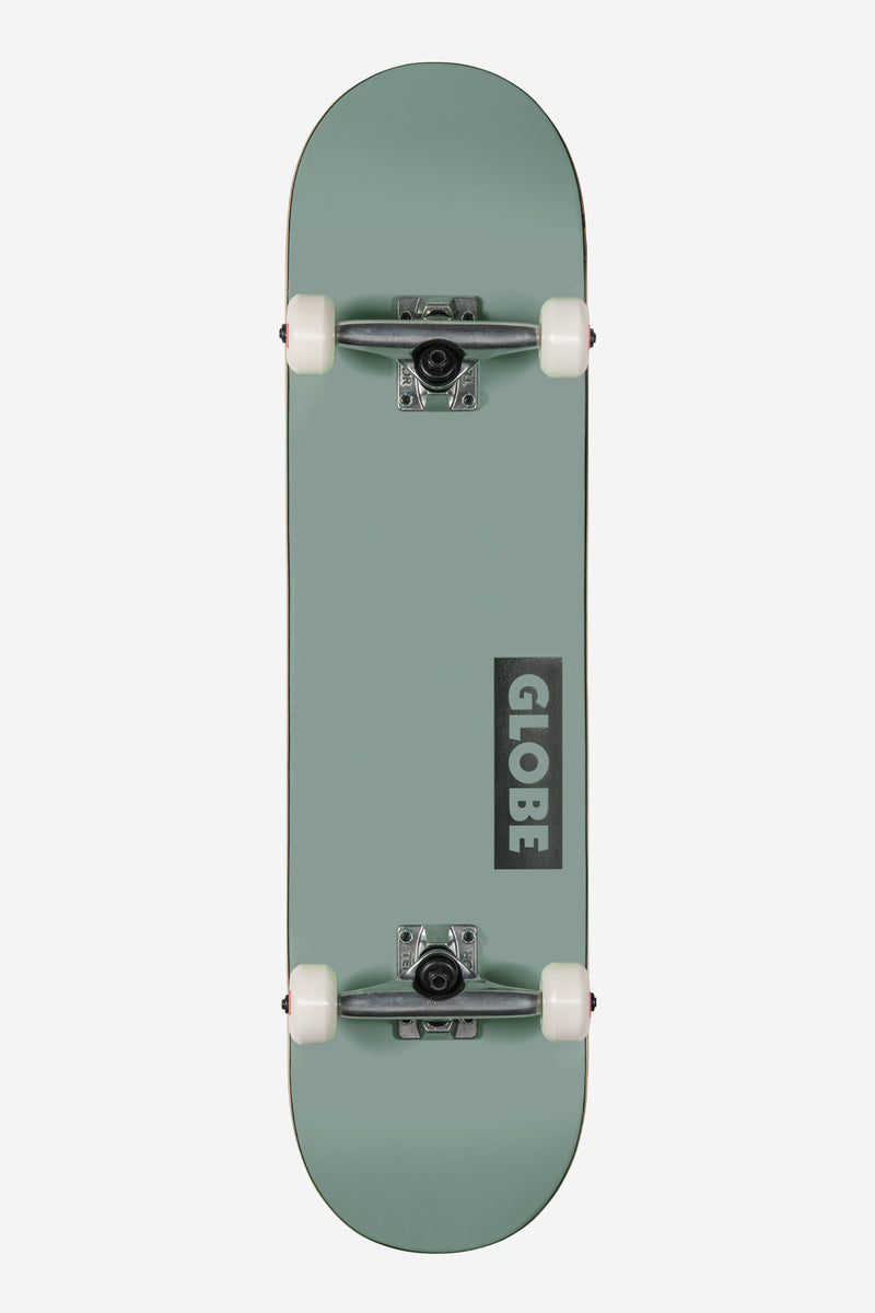 Top view of a Goodstock Fog complete skateboard with an 8.5 inch green deck, white wheels, and silver trucks.