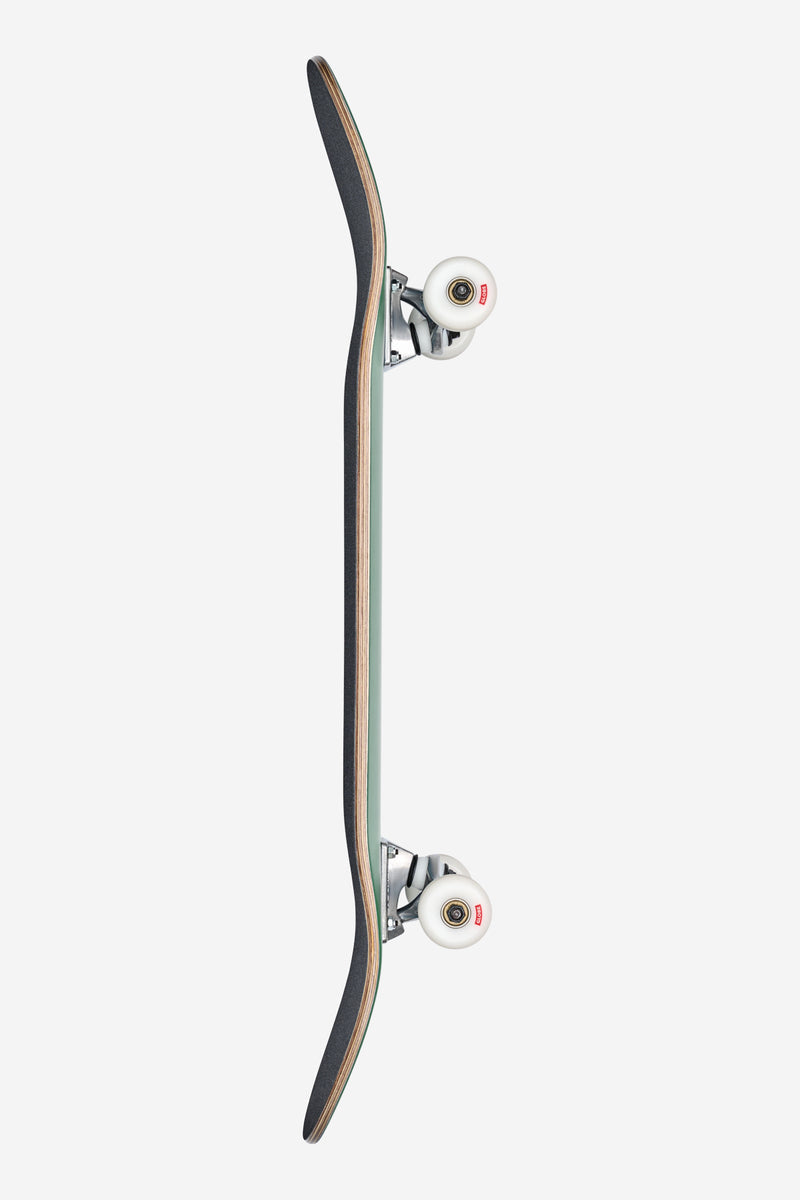 Side view of Goodstock Fog 8.5 inch complete skateboard with Tensor alloy trucks and white wheels