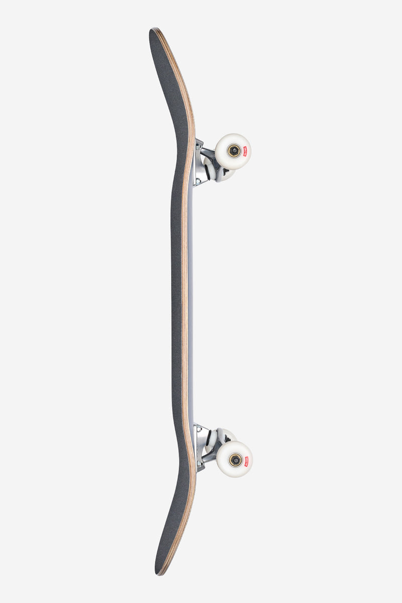 Side view of Goodstock Complete 9.0 inch midnight blue skateboard with silver trucks and white wheels
