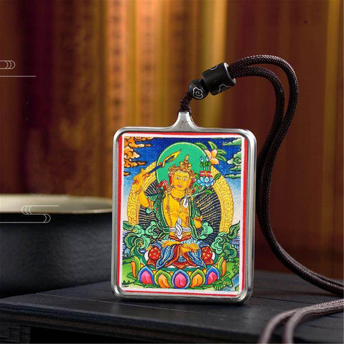 Handpainted Locket Thangka Amulet,Manjusri,Wisdom Buddha - Tibetan thangka painting, close-up detail