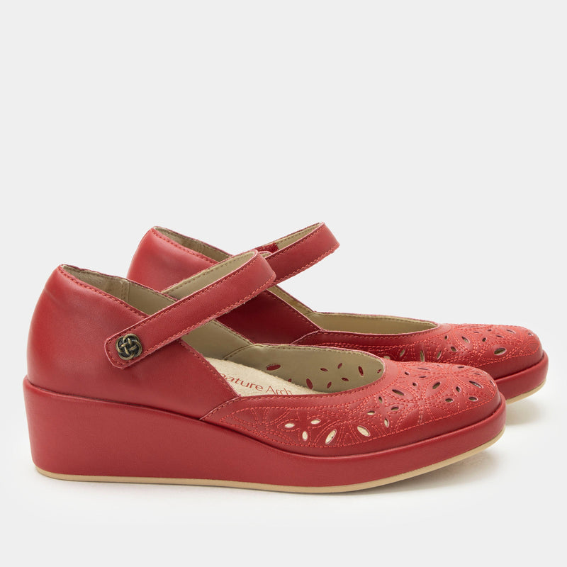 Hayes Ruby Breeze Shoe on a Trimform wedge outsole | Red leather mary jane shoe with laser cutouts on a wedge heel outsole.