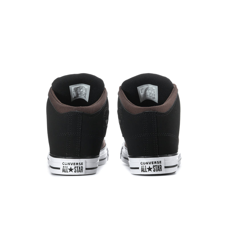 Back view of black and brown high-top sneakers with Converse All Star heel tab