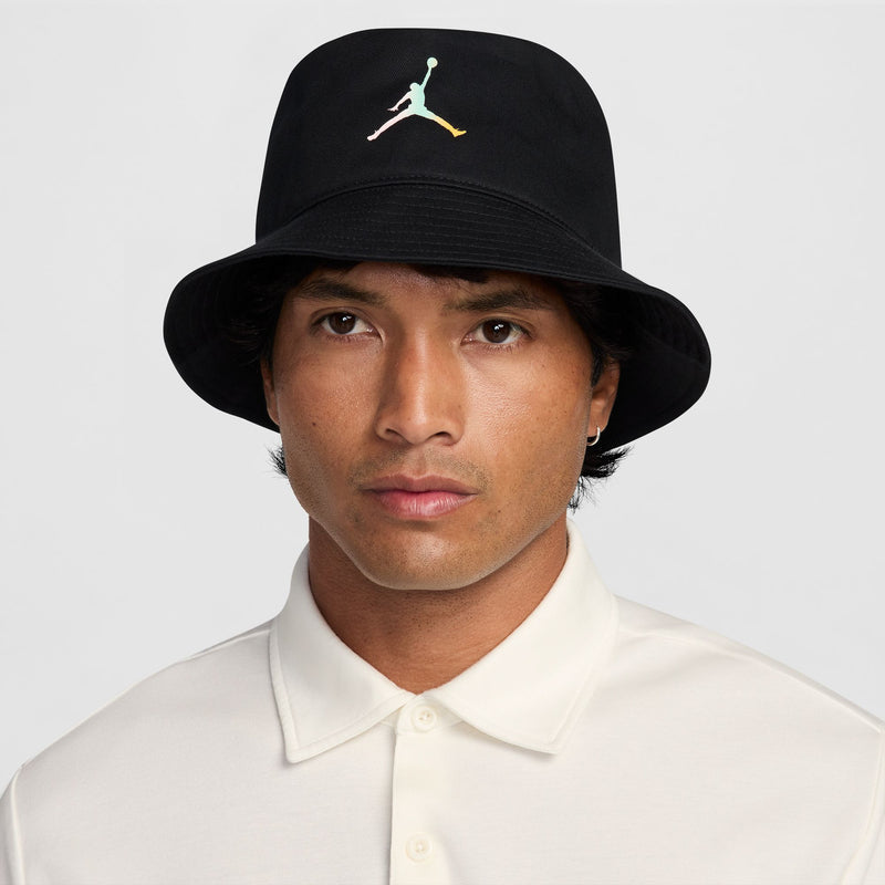 Black Jordan bucket hat with multicolor Jumpman logo, worn with crown brim.