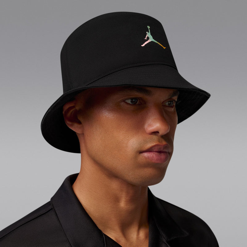 Black bucket hat with multicolor Jumpman logo on front, side profile.