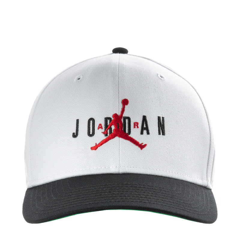 White structured snapback cap with Jordan wordmark and red Jumpman logo