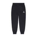 Youth black jogger pants with Jumpman logo on right thigh