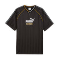 Men's black relaxed soccer jersey with V-neck, yellow trim, and Puma King logo