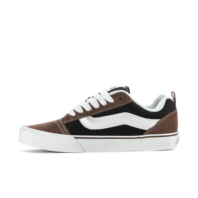 Men's low-top sneakers with brown suede overlays, black stripe, white laces and sole