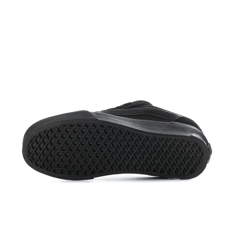 Black outsole of low-top skate shoe with deep tread pattern