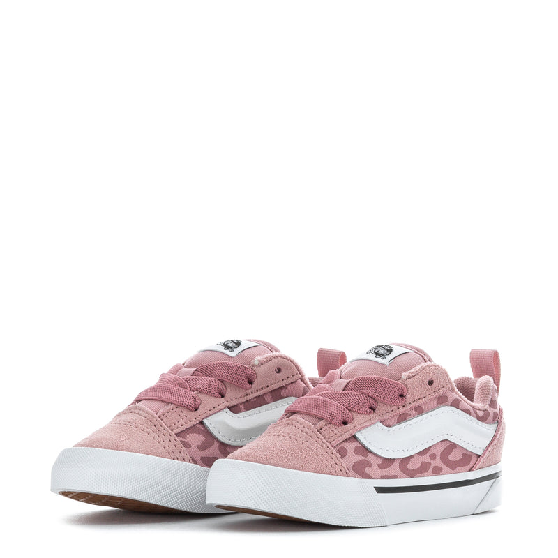Toddler sneakers pair in dusty pink leopard camo with white soles and lace-up tops