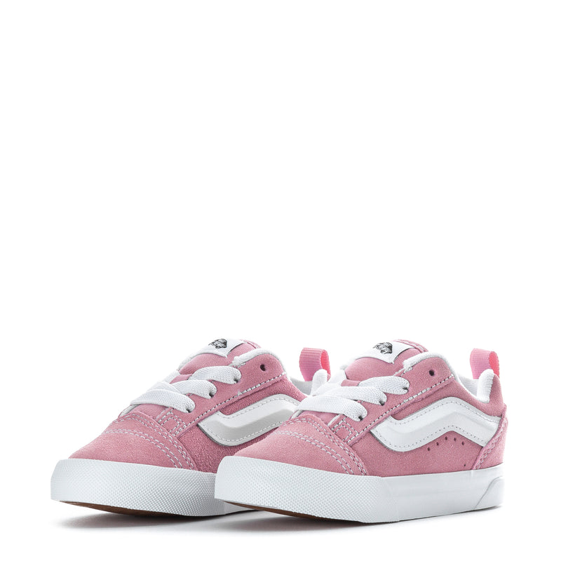 Toddler pink suede sneakers pair with white stripes and lace-up front