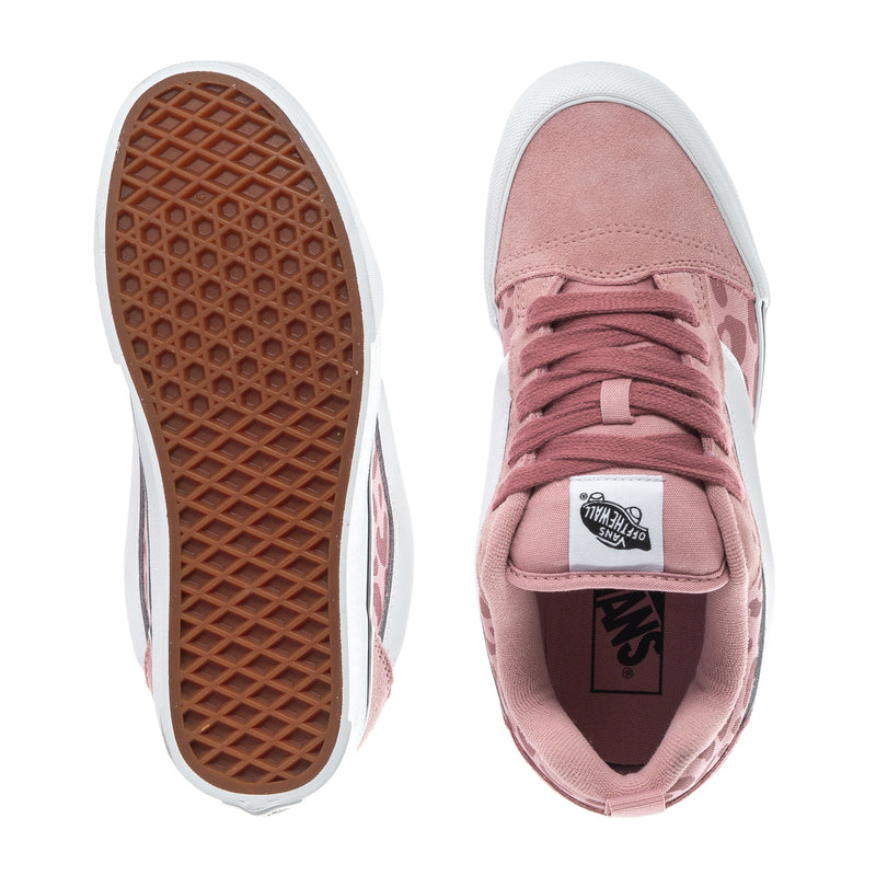 Youth pink low-top sneakers with brown tread outsole and padded collar