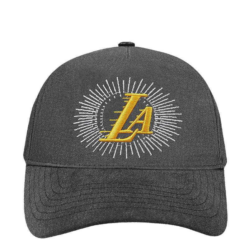 Washed black Lakers snapback cap with yellow LA skull emblem on front