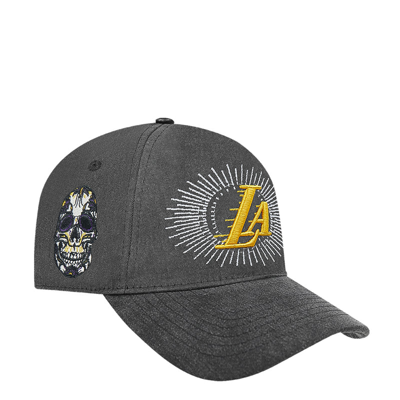 Washed black snapback cap with LA sunburst logo and multicolor skull side patch