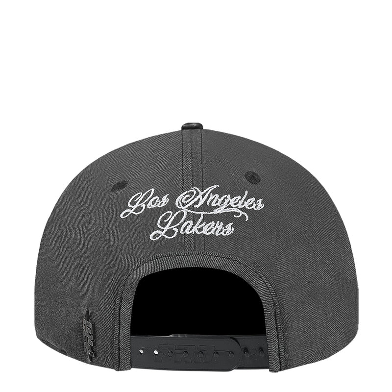 Washed black snapback cap with “Los Angeles Lakers” script logo on back