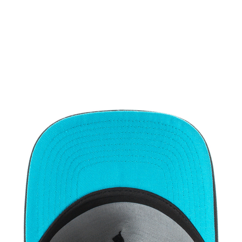 Turquoise interior brim panel with stitched eyelets